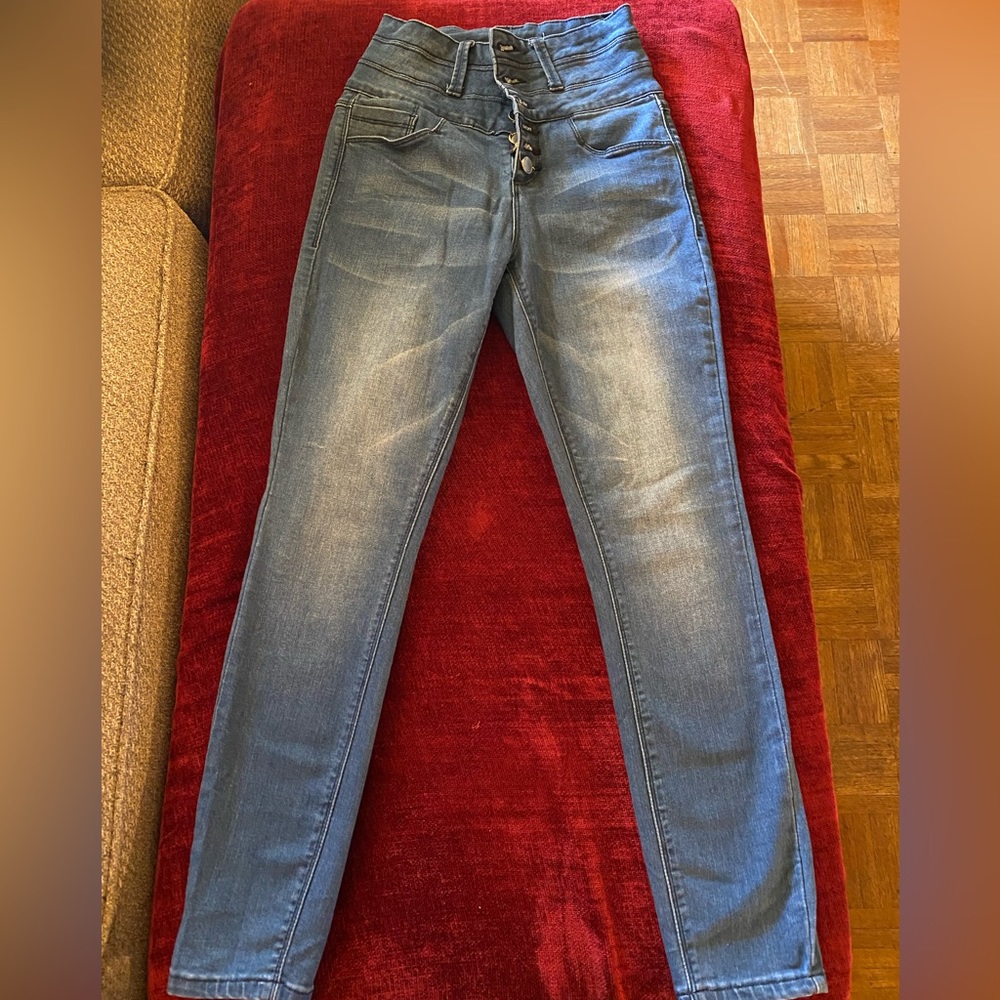 Medium wash Bebe high waisted jeans